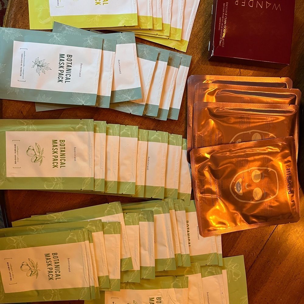 Lot of 42 face masks and 6 sets of eye masks.